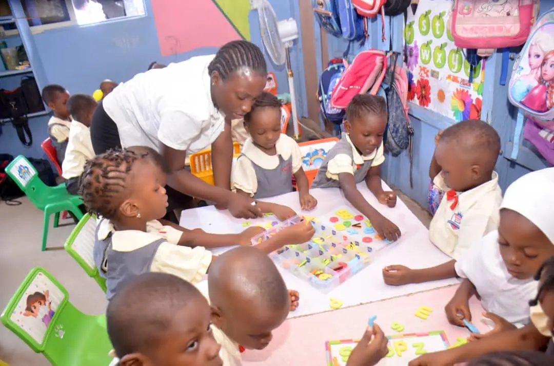 Topcrown School pupils learning with their teacher
